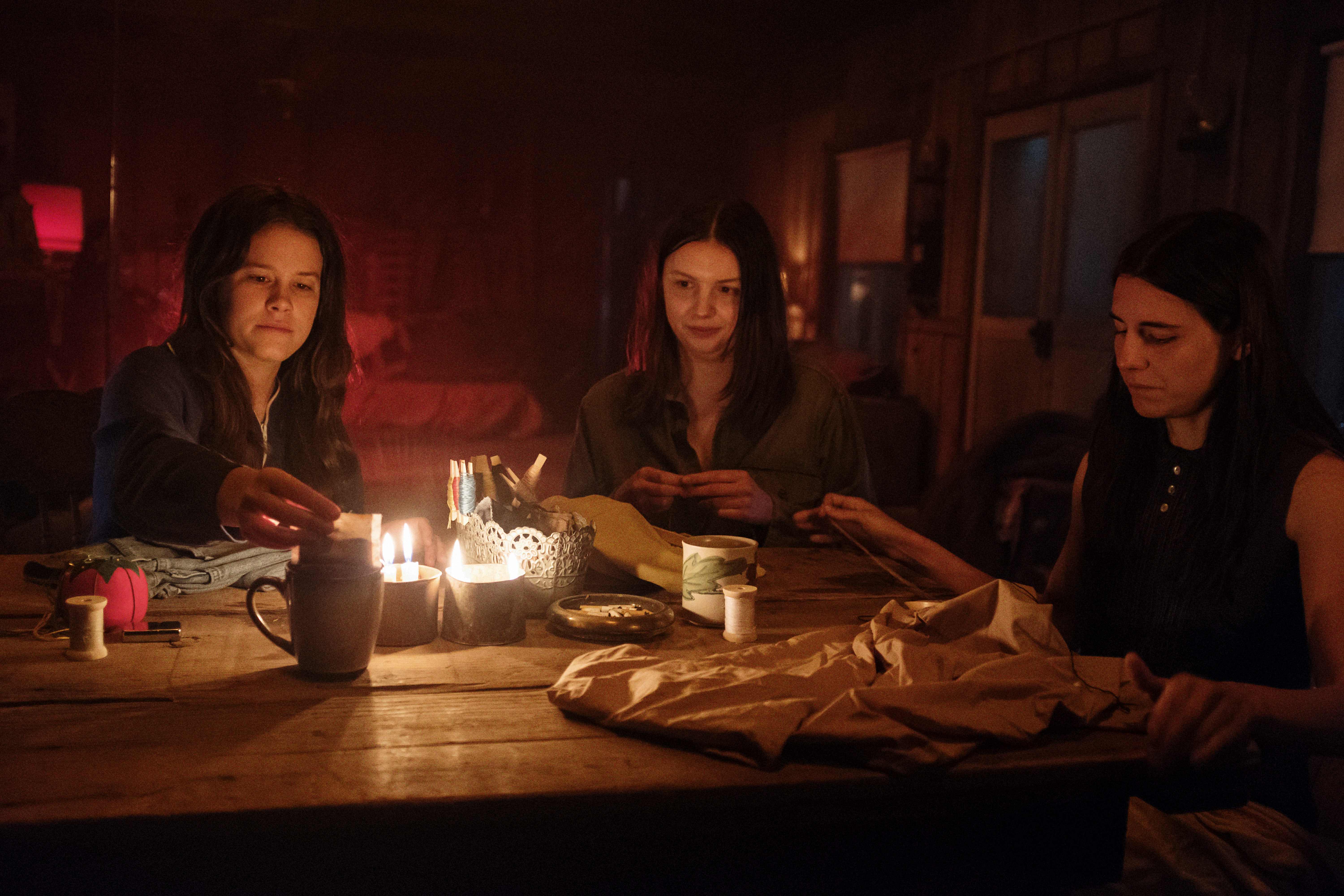 Sosie Bacon as Patricia Krenwinkel, Hannah Murray as Leslie Van Houten and Marianne Rendón as Susan Atkins in Mary Harron’s Charlie Says.