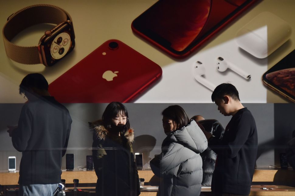 Apple is shifting its focus to software services and trade-in programs to supplement iPhone sales.