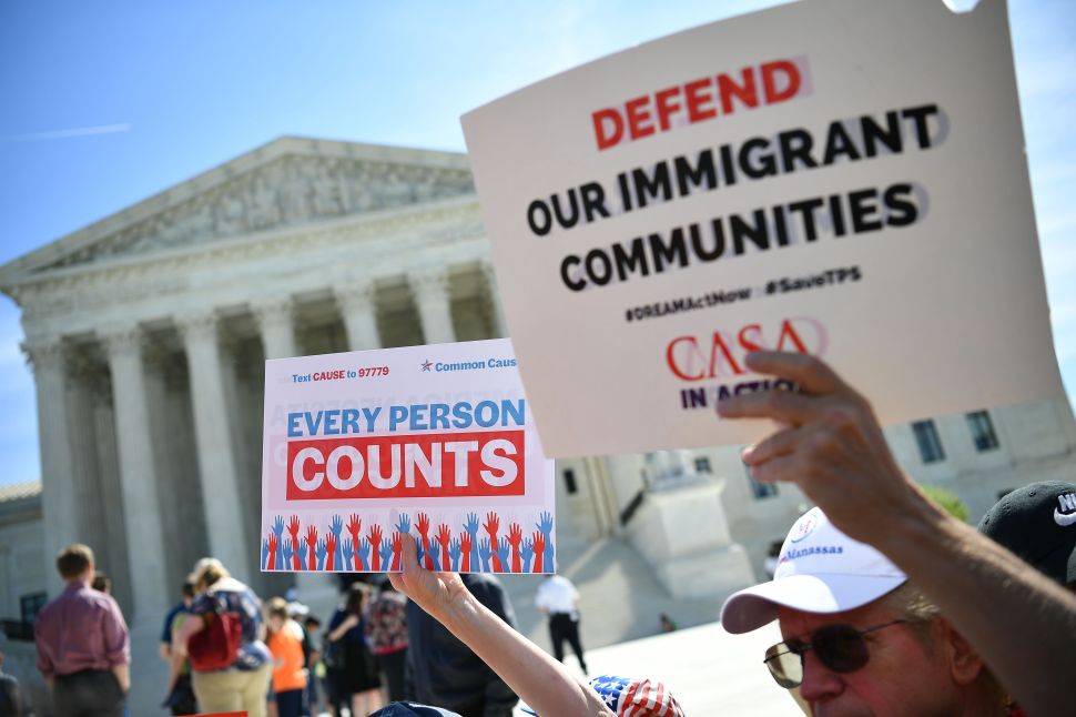 Demonstrators rally at the US Supreme Court in Washington, D.C., on April 23, 2019, to protest a proposal to add a citizenship question to the 2020 Census.
