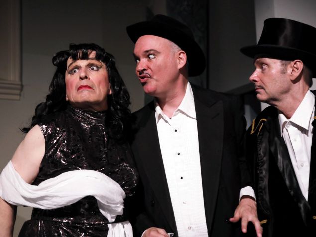 Tempestuous diva Maria Magdalena Galas (Everett Quinton, left) defies the impresarios of La Scala.