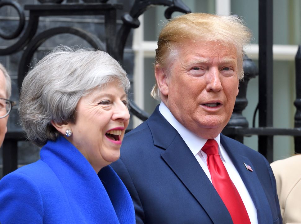 British Prime Minister Theresa May welcomes U.S. President Donald Trump.