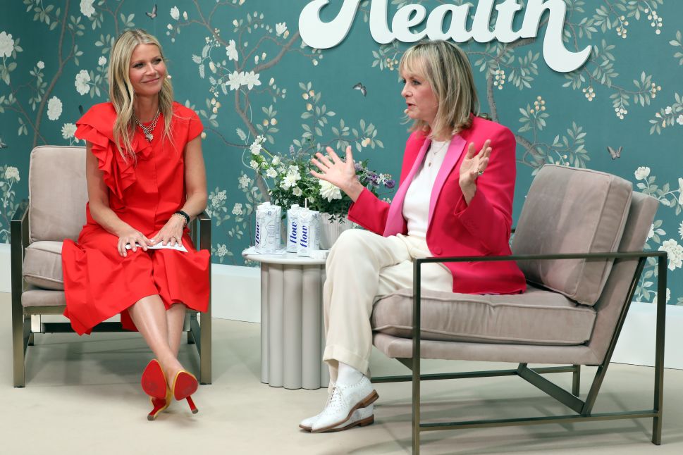 Gwyneth Paltrow chatting with Twiggy on the London Goop stage.
