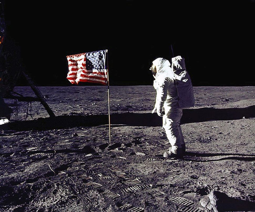 Astronaut Buzz Aldrin salutes the U.S. flag on the surface of the moon during the Apollo 11 lunar mission on July 20, 1969. 