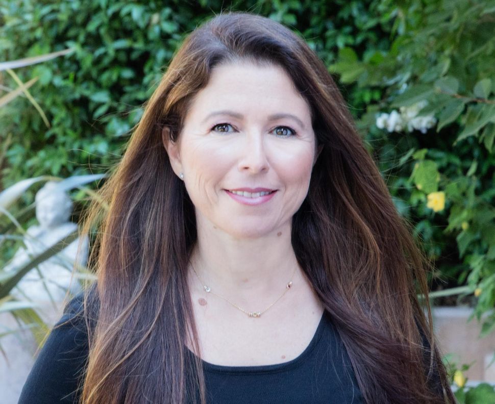 Laura Yecies is the CEO of SyncThink