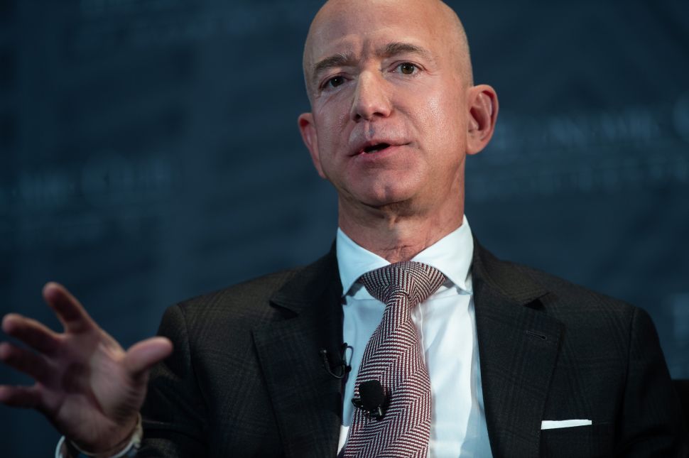 Amazon CEO Jeff Bezos says investing in one-day shipping has been beneficial to customers.
