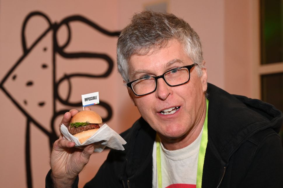 Impossible Foods CEO Patrick Brown with an Impossible Burger.