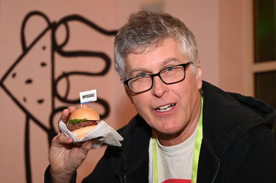 Impossible Foods CEO Patrick Brown with an Impossible Burger.