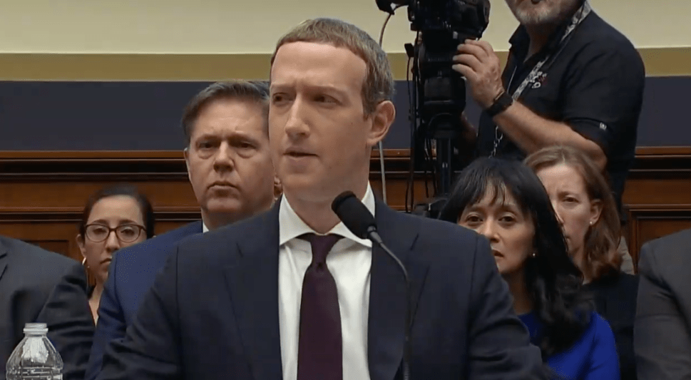 Mark Zuckerberg looks slightly annoyed and confused after Congressman Brad Sherman's attack on Facebook's Libra project.