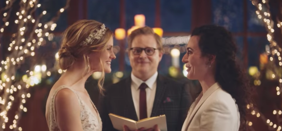 Zola.com has been touted as a progressive brand for standing by its same-sex wedding commercial.