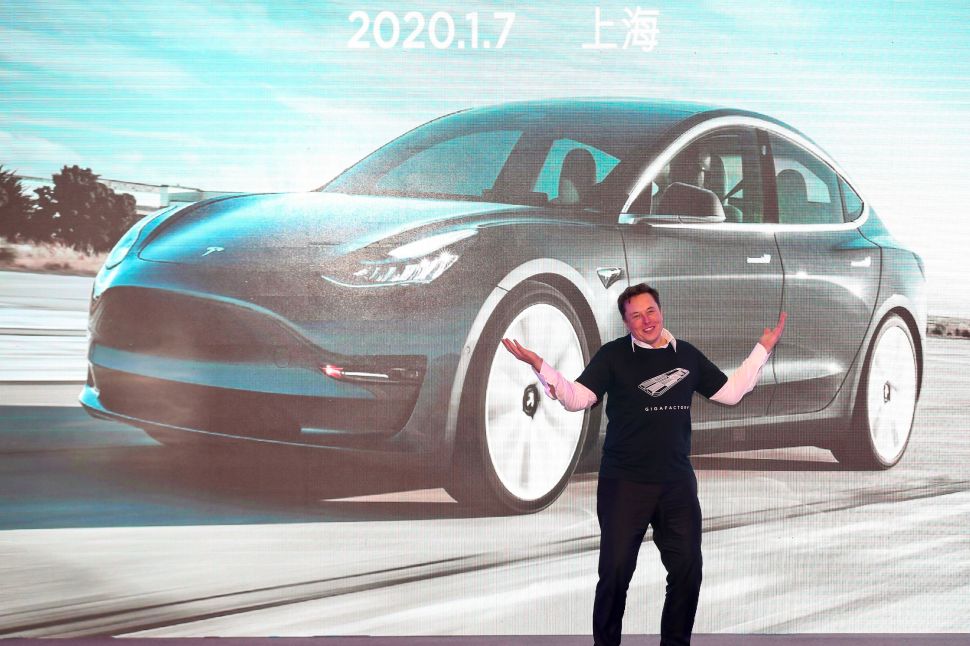 Tesla CEO Elon Musk gestures during the Tesla China-made Model 3 Delivery Ceremony in Shanghai on January 7, 2020.
