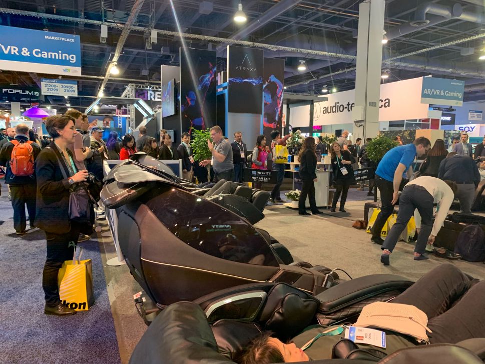 A long line again outside Infinity Massage Chairs.