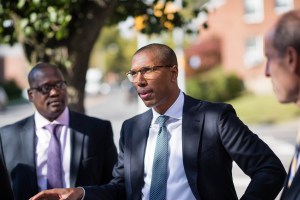 Mr. Tredway talks to Regional Sales Manager Robert Keenan (right) and Associate Andrew Musoke (left) (Francesco Sapienza)