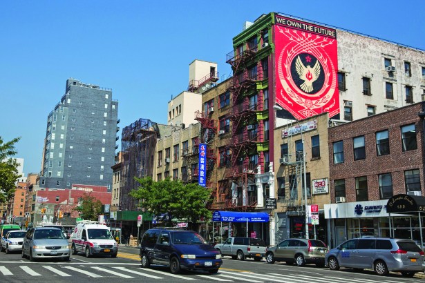 Artist Shepard Fairey Puts New Mural Up In Manhattan's Little Italy Neighborhood