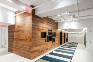 Teach for America's new reception area includes digital screens to display its core values. 