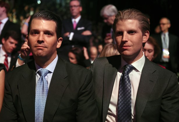 Donald Trumps son's Eric Trump (L), and Donald Trump Jr. wait for the start of the CNBC Republican Presidential Debate, October 28, 2015 at the Coors Event Center in Boulder, Colorado. (ROBYN BECK/AFP/Getty Images)