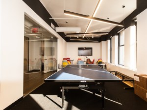 In a tech-driven environment, the fifth-floor meeting room features a Ping-Pong table and colorful chairs (Photo: Emily Assiran/Commercial Observer). 
