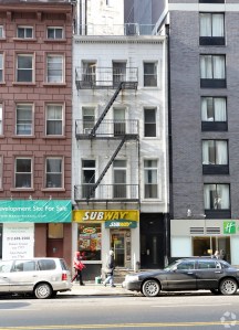 The buildings at 120 and 122 Water Street, next to the Holiday Inn Express, are being demolished now (Photo: CoStar Group).