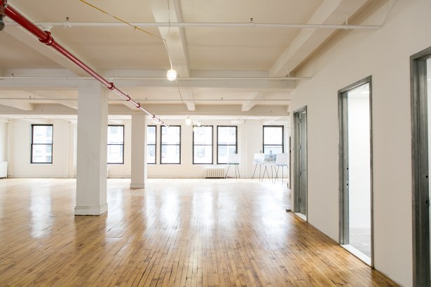 The landlord kept the original floors of the building to keep with the gritty look of Midtown South. 