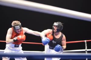 Eric Weinberg, right, throws a punch at his opponent. Photo: Eric Weinberg. 