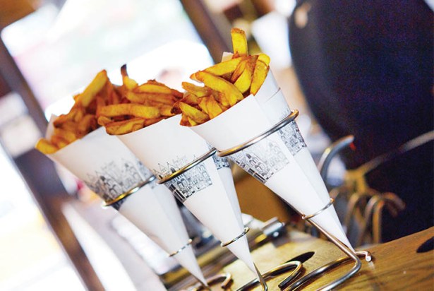 FRY DAZE: Pommes Frites, with its cone of Belgian-style fries, has had a slow go of it since reopening in May on MacDougal Street.